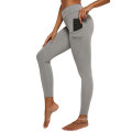 Pantalones de yoga cómodos sólidos en blanco con bolsillos pantalones de chándal sin costuras de cintura alta mujeres